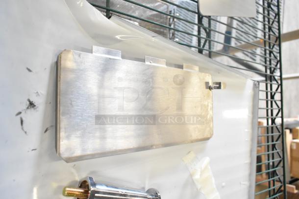 Brand new Avantco 184T140 commercial conveyor toaster component. Scratch and dent condition visible. Metal surface detailing.