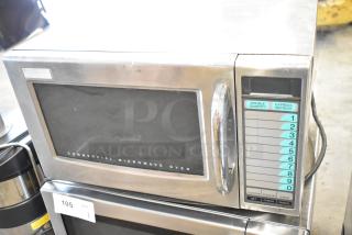 Sharp R-21LVF Commercial Microwave Oven, stainless steel, keypad controls, 120V, displays "Commercial Microwave Oven."