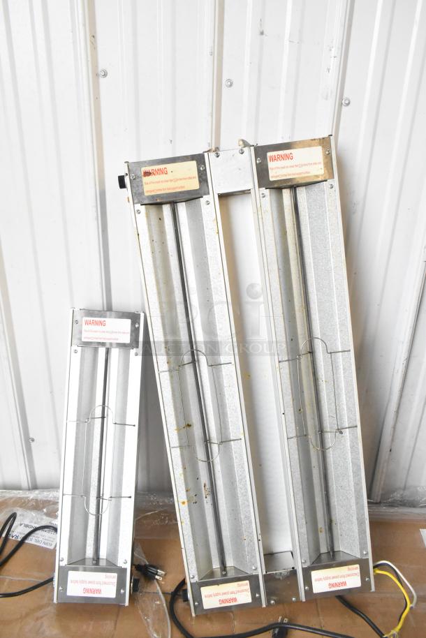 14 brand new ServIt strip warmers, scratch and dent, 120V, 1 phase, warning labels visible, various sizes.