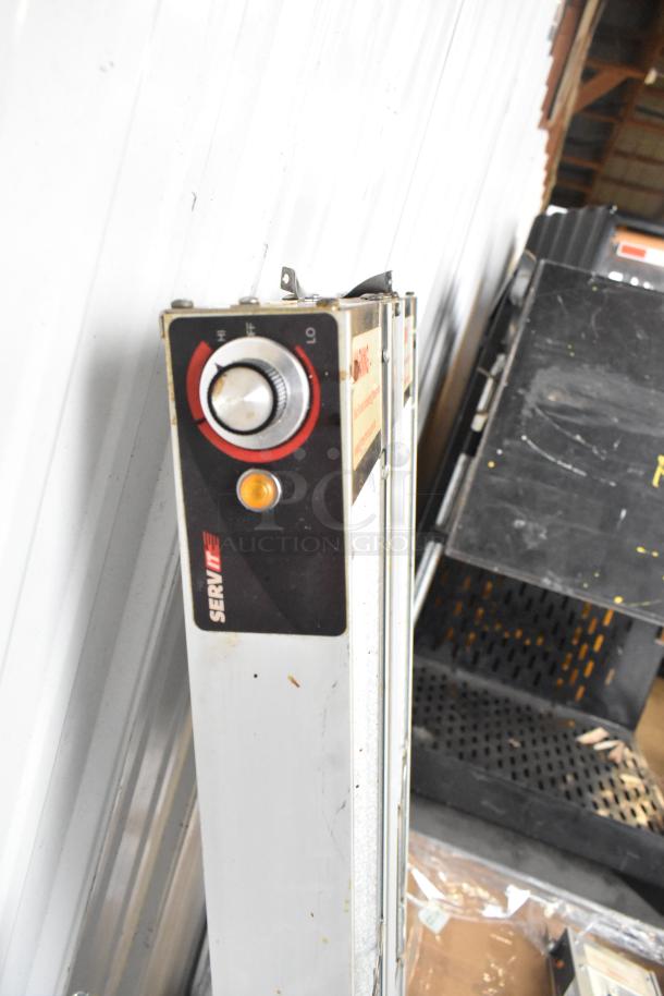 ServIt strip warmer, scratch and dent, 120 volts, 1 phase. Visible control knob and brand label.