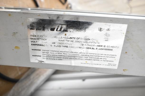 14 new ServIt strip warmers, scratch and dent. 120V, 1 phase, 36", 1700W. Tag shows model, voltage, and safety warnings.