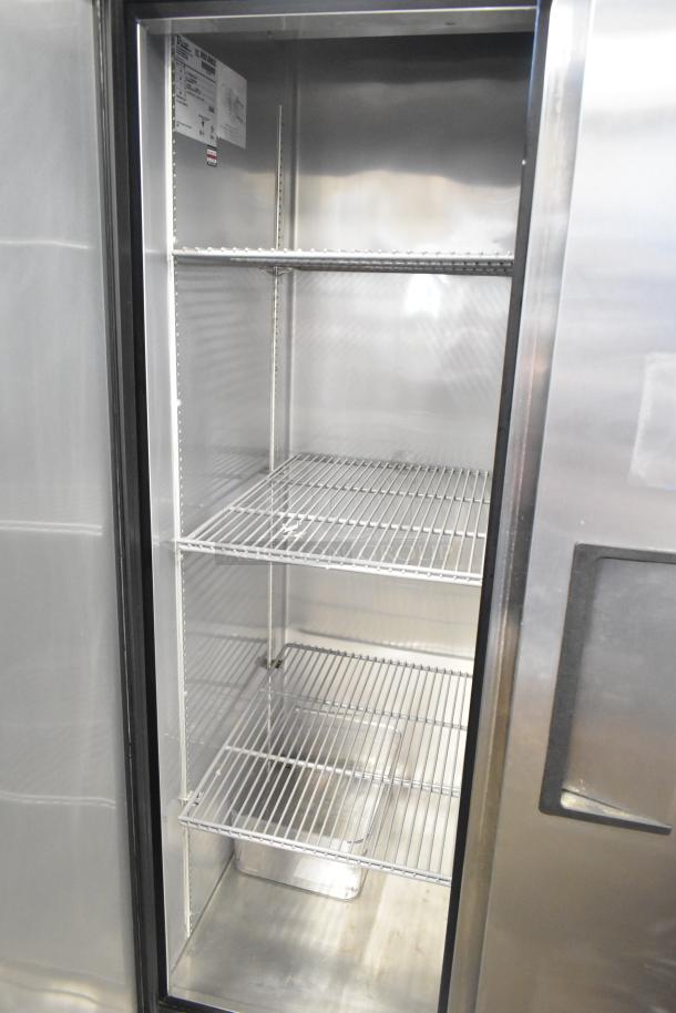 2016 True T-35 Reach-In Cooler, 2-door, 115V, commercial use, stainless steel, shelves visible, manufacturer's label inside.