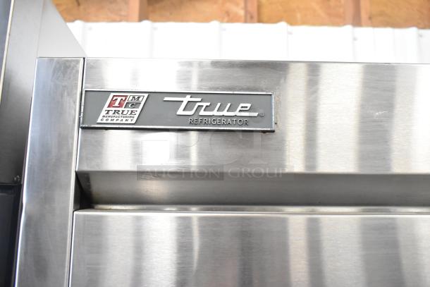 2016 True T-35 Commercial 2 Door Reach-In Cooler, stainless steel, 115 volts, model tag visible, excellent condition.