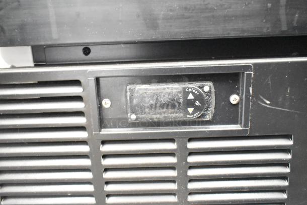 2019 Habco SE18 commercial cooler, single door, 115 volts, temperature control dial visible, good condition.