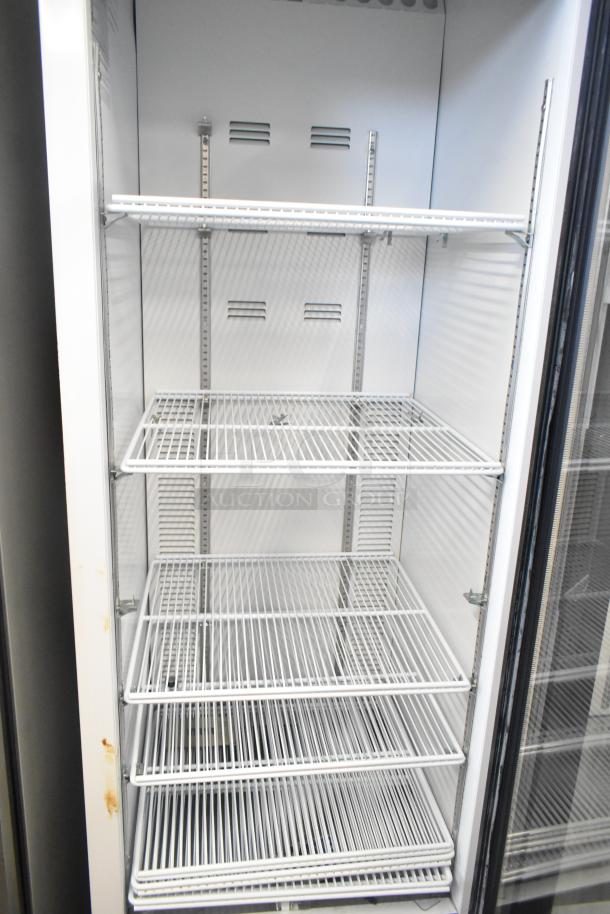 2019 Habco SE18 Commercial Single Door Cooler, 115 Volts, in good condition with adjustable wire shelves.