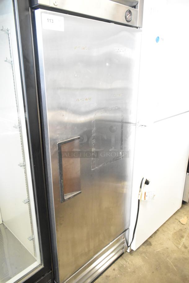 True T-19F Commercial Single Door Reach-In Freezer, stainless steel, 115 volts, 1 phase, visible wear, model label on top.