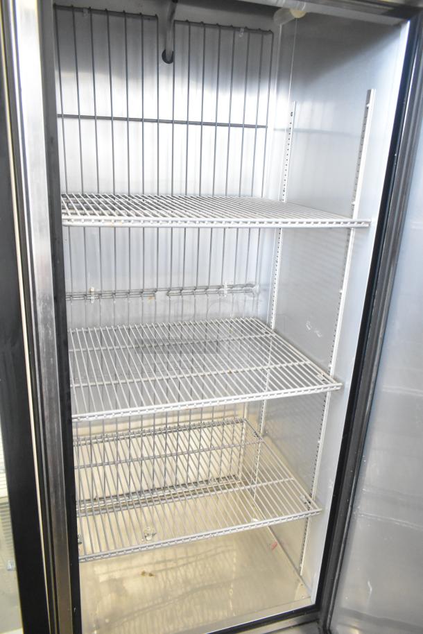 True T-19F commercial reach-in freezer, single door, stainless steel, 115 volts, 1 phase, with adjustable shelves.