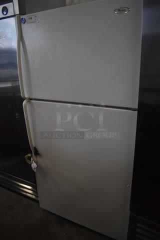 Whirlpool ET1MHKXMQ04 reach-in cooler with freezer, 115 volts, 1 phase, visible wear, numbered label "114."