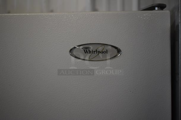 Whirlpool ET1MHKXMQ04 reach-in cooler with freezer, white textured finish, visible brand logo, 115 volts, 1 phase.