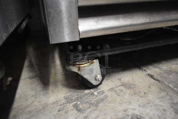 2016 True T-19F reach-in freezer on caster. Shows commercial caster detail, condition appears used. 115V, 1 Phase.