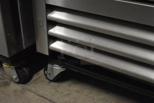 2025 True T-19F-HC commercial freezer bottom view on casters, stainless steel finish, 115V, 1 phase.