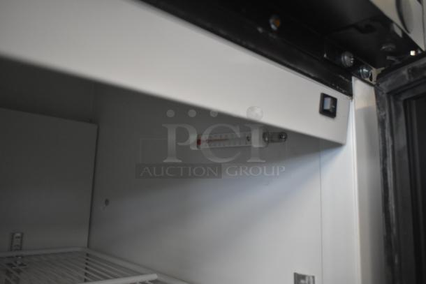 2019 Habco SE18 commercial cooler interior; includes temperature gauge. Single door, 115V, 1 phase, excellent condition.