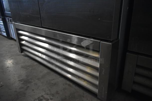 2021 True T-35-HC commercial cooler, two doors, stainless steel, 115 volts, 1 phase. Visible wear on exterior.