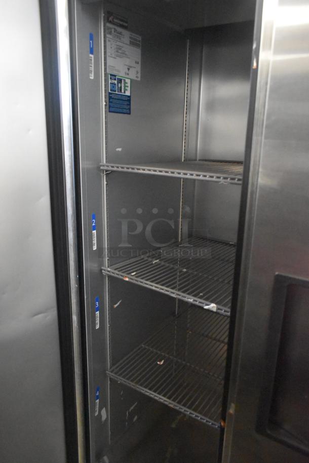 2021 True T-35-HC commercial reach-in cooler with two doors, interior shelving, 115 volts, 1 phase, and condition details.