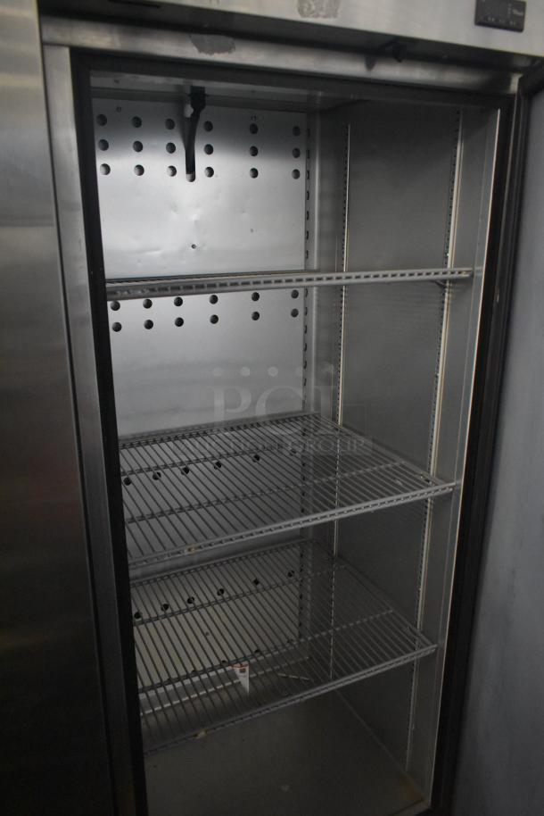2021 True T-19F-HC commercial reach-in freezer, single door, shelves visible, 115V, 1 phase, clean interior, excellent condition.