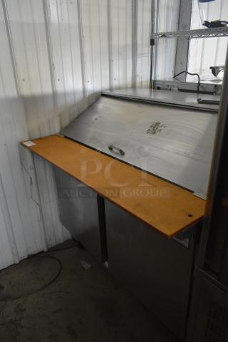 Beverage Air commercial sandwich salad prep table, Bain Marie mega top, on casters, 115V, with stainless steel surface.