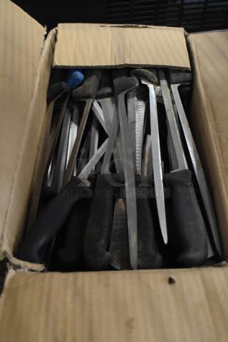 Box of 80 sharpened stainless steel knives with black handles, including a fillet knife. Used condition.