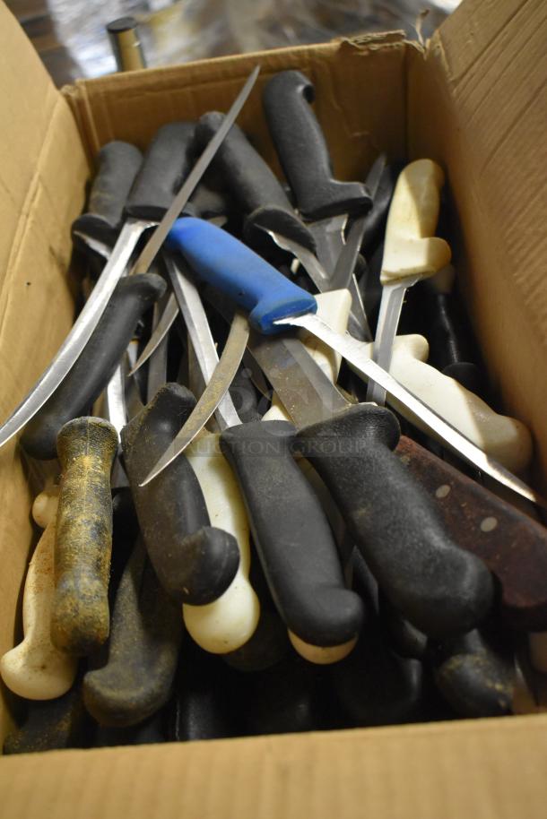 Cardboard box with 50 sharpened stainless steel knives, including a fillet knife, various handles in black, white, and blue.