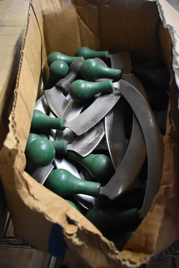 Cardboard box with 60 sharpened stainless steel knives, including serrated and rocking varieties, with green handles.