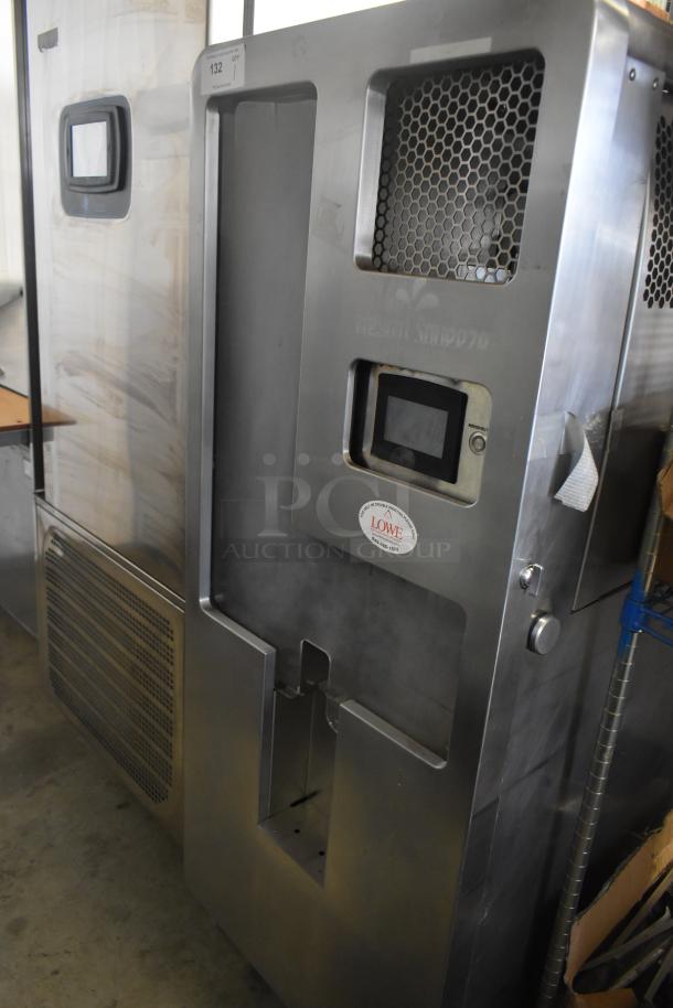 JBT 2ND-GEN-MFJ-HE citrus juicer, commercial floor model on casters, stainless steel, 115V, features touch control panel.