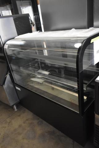 Brand new Avantco BC-48-HC 48" curved glass black bakery display case. Scratch and dent. Visible Avantco label.