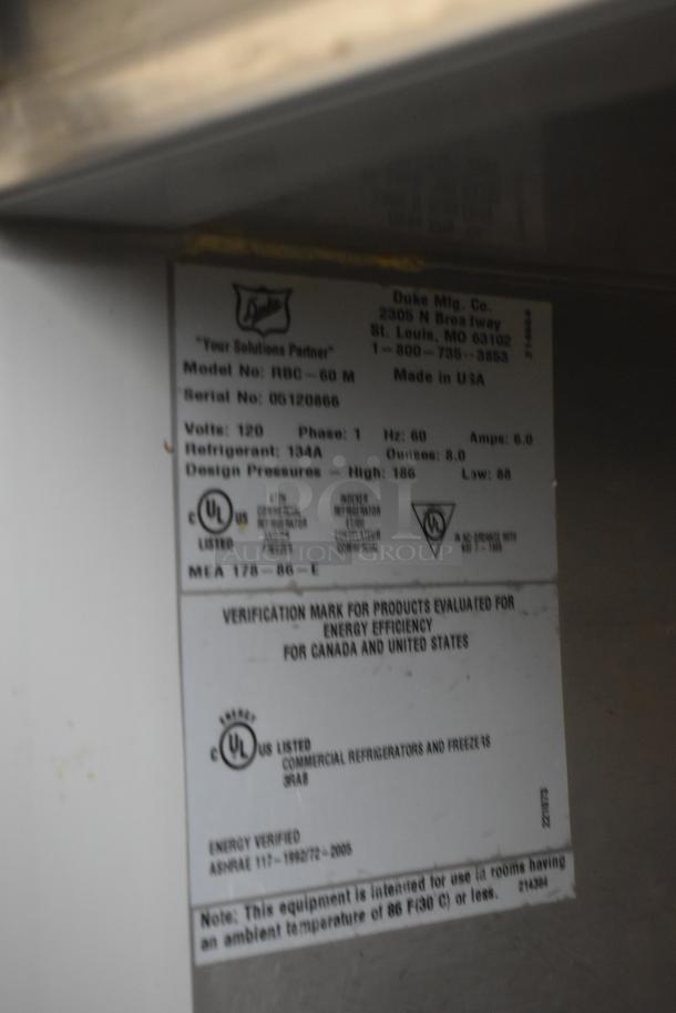 Duke RBC-60M Commercial 3 Door Work Top Cooler label, 120V, 1 Phase, model and serial number details, UL listed.