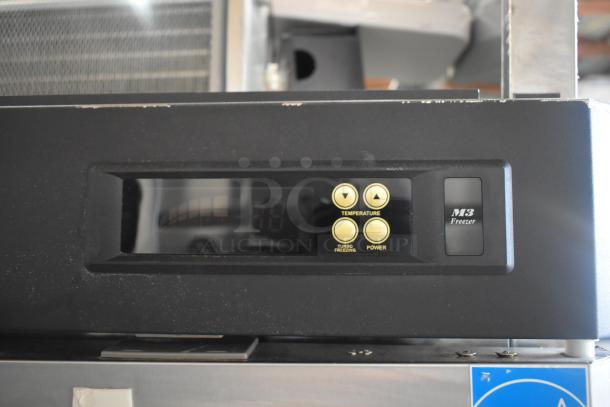Turbo Air M3F24-1-N commercial freezer, control panel view, 115 volts, 1 phase, temperature settings, model label.