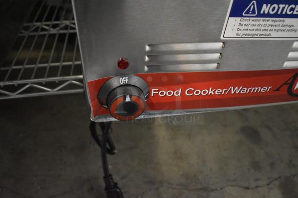 Brand new Avantco 177W50CKR 12"x20" electric food warmer, scratch and dent, 120V, 1-phase. Features control knob and warning label.