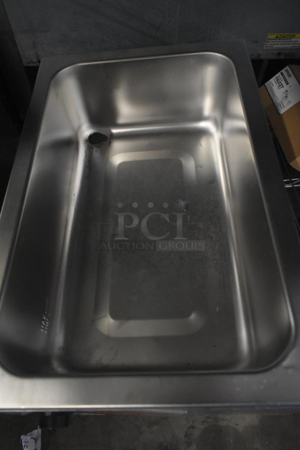 Brand new Avantco 177W50CKR 12"x20" electric food warmer. Some scratches (dent visible). 120V, 1 phase.