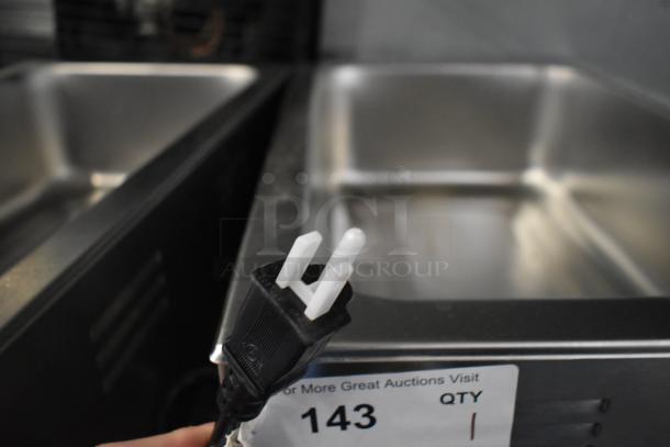 Brand new Avantco 177W50CKR electric countertop food warmer, 12"x20", 120V, with plug and visible unit label indicating item 143.