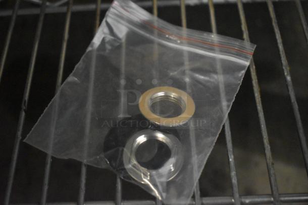 Wall-mounted faucet components in a plastic bag, includes a 3 1/2" swivel gooseneck spout and 4" centers, brand new condition.