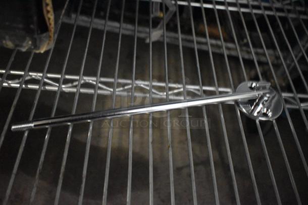 Wall-mounted mop sink faucet, Regency 600FMS86, 6.5" spout, 8" centers, with vacuum breaker, slight scratches, new condition.