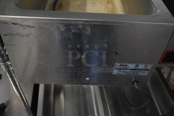 Winco FW-S500 commercial countertop food warmer, stainless steel, 120 volts, 1 phase, visible wiring and product label.