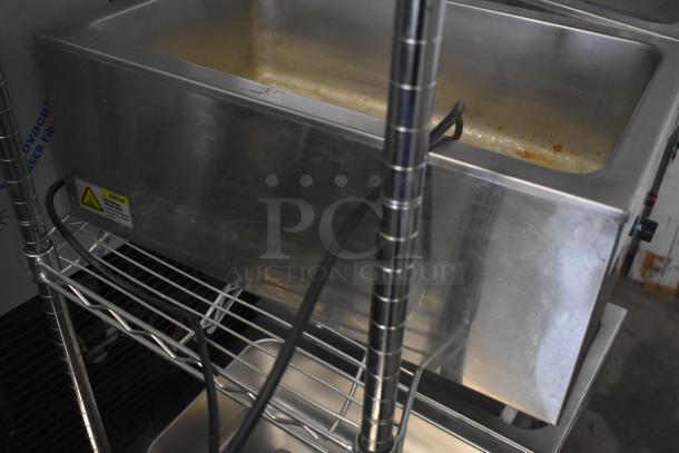 Winco FW-S500 Commercial Countertop Food Warmer, stainless steel, 120V, 1 phase, minor wear, caution label visible.