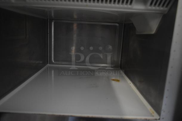 2021 Menumaster MFS18TS commercial microwave interior, 208/240V, 1 phase, minor surface stains, overall good condition.