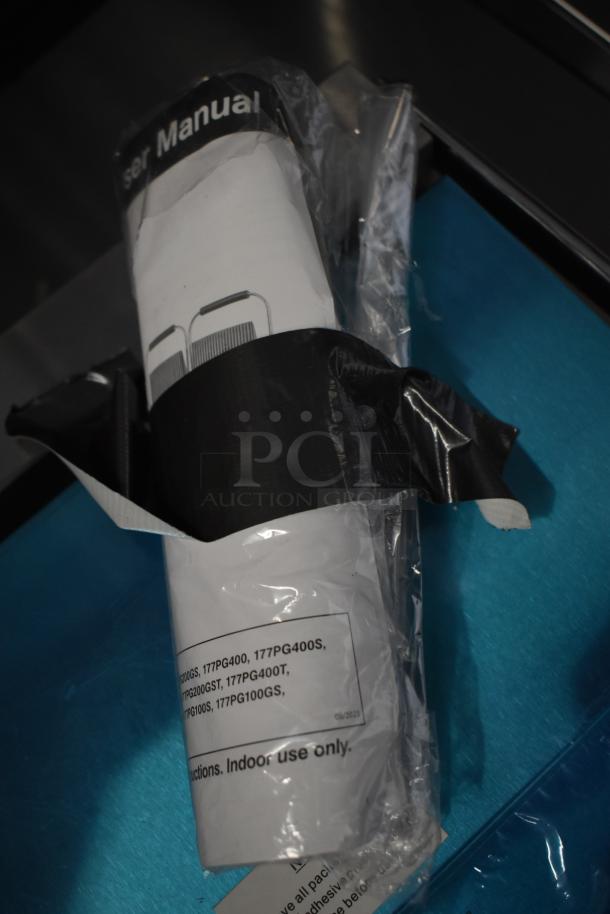 Avantco 177PG200 Panini Grill user manual, sealed in plastic with visible model numbers, new condition.