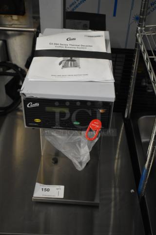 BRAND NEW Curtis D60GT12A000 coffee brewer, low profile, 120V, scratch and dent condition. Includes user guide.