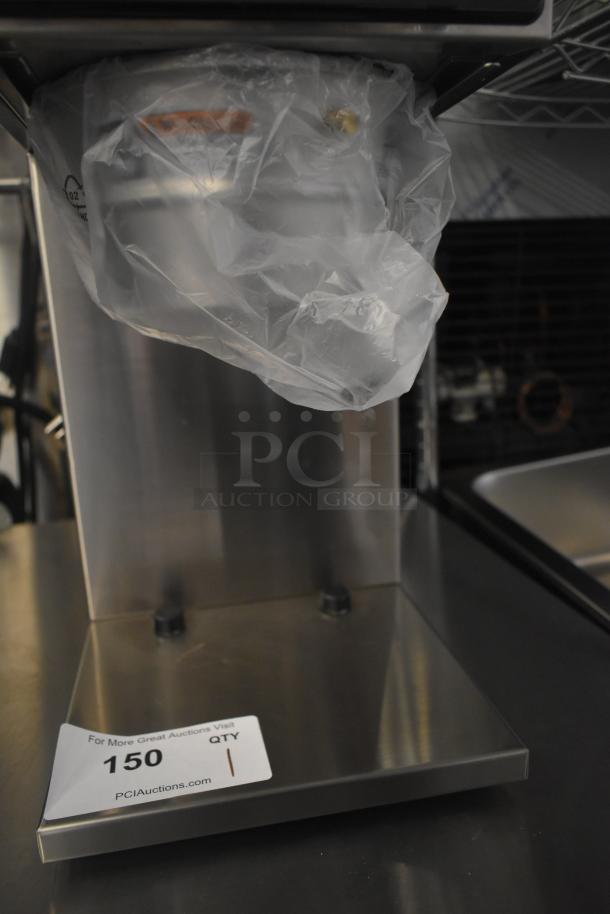 Brand new Curtis D60GT12A000 coffee brewer, low profile, thermal carafe. 120 Volts, 1 Phase. Scratch and dent condition.