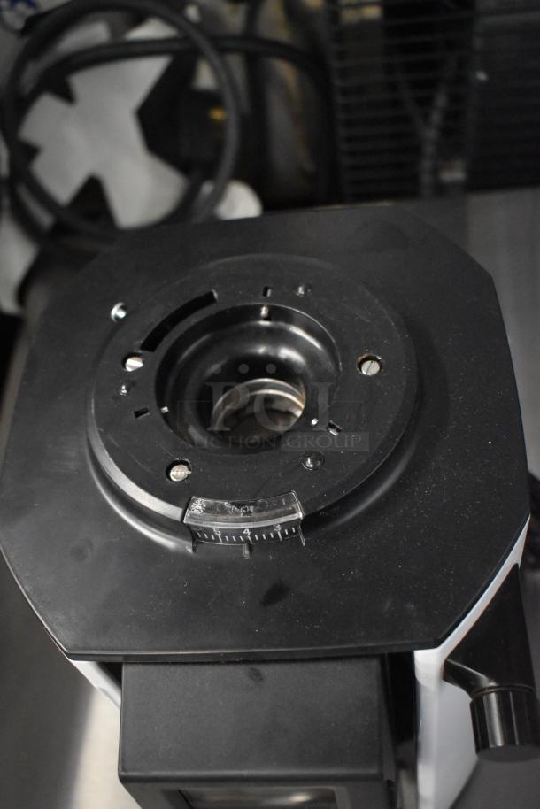 Anfim AF05 Luna white espresso grinder, scratch and dent condition, 4.4 lb. capacity, 120V, 1 phase power.