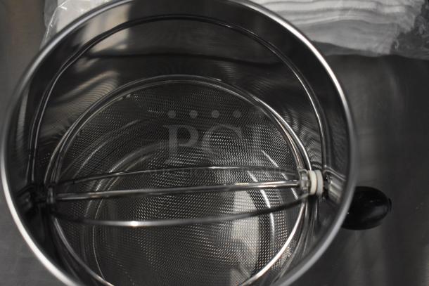Stainless steel sifter in brand new condition, part of a 13-item auction set. Includes drop-in bins and flour sack.