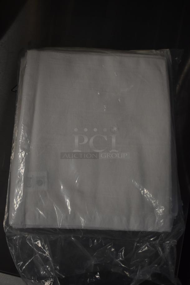 Alt text: Packaged flour sack in clear plastic, part of a set of 13 brand new items including kitchen essentials.