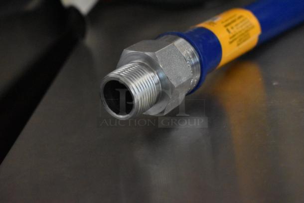 Brand new Dormont 1675KIT48 moveable gas connector kit, 48" with 3/4" diameter, SnapFast® Quick Disconnect, two elbows, restraining cable.