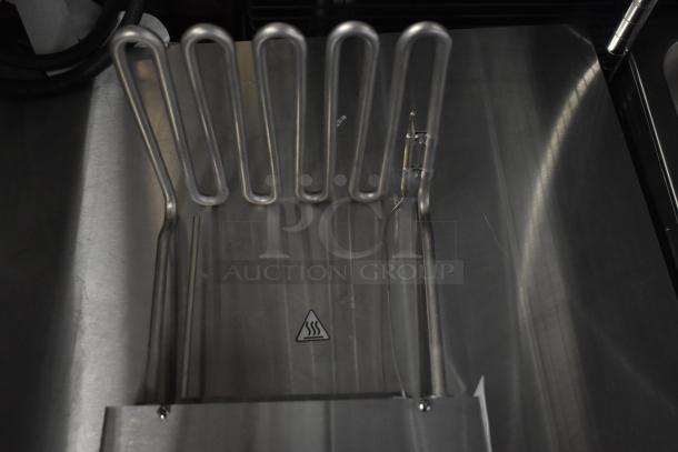BRAND NEW SCRATCH AND DENT Fryer Burner, stainless steel finish, visible heat caution symbol, minor marks.