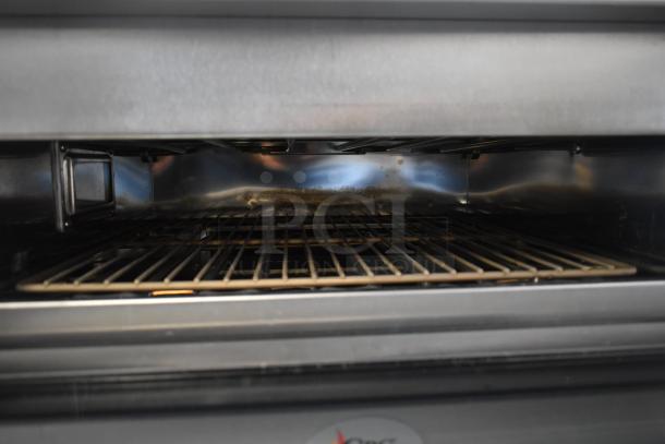 Electric ventless impingement oven by Cooking Performance Group, stainless steel, scratch and dent condition, 208/240V, 1 phase.