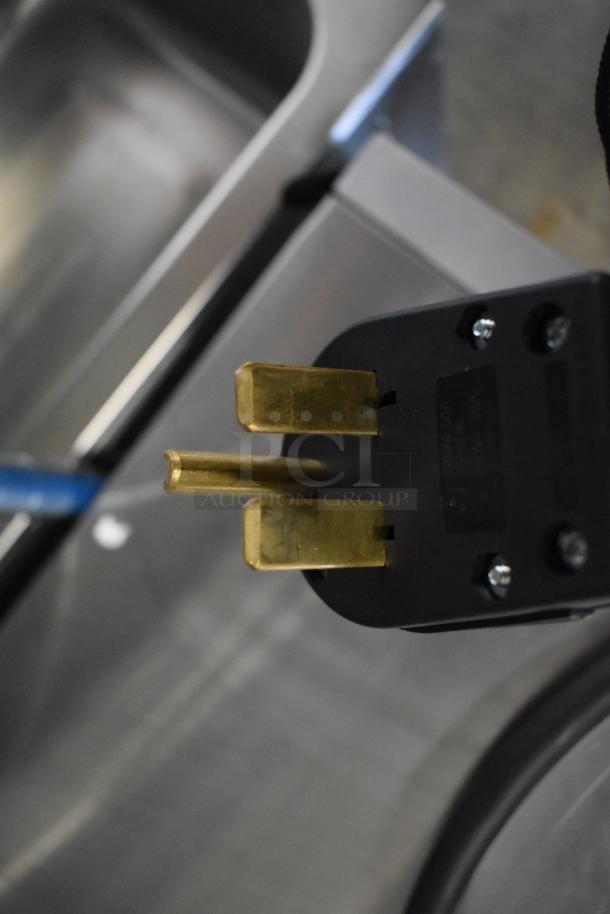 Electric plug of a Cooking Performance Group HSIO-H high-speed impingement oven, showing a 208/240V, 1 Phase connection.