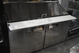 Brand new Avantco 178APT60MHC Commercial Sandwich Salad Prep Table, stainless steel, dents visible, 115V, 1 Phase.