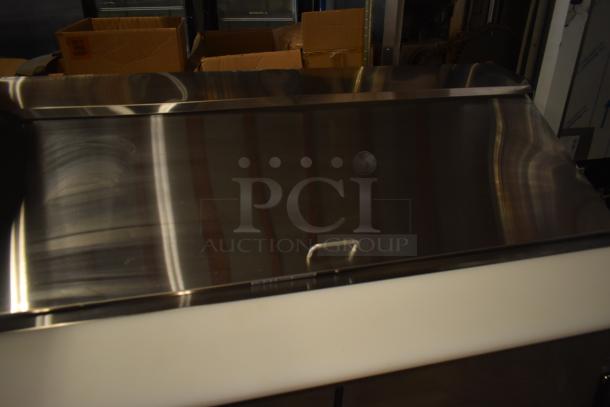 Brand new Avantco 178APT60MHC commercial sandwich salad prep table, scratch and dent, stainless steel, 115V, 1 phase.