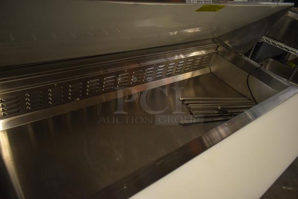 Brand new Avantco 178APT60MHC commercial prep table; stainless steel, mega top, 115V, 1 phase, minor scratches.