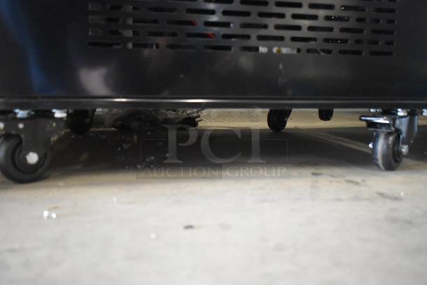 BRAND NEW Avantco 4-Sided Glass Refrigerated Display Case, Model 193GD4C15HCB, on commercial casters. 110-120V, 1 Phase.