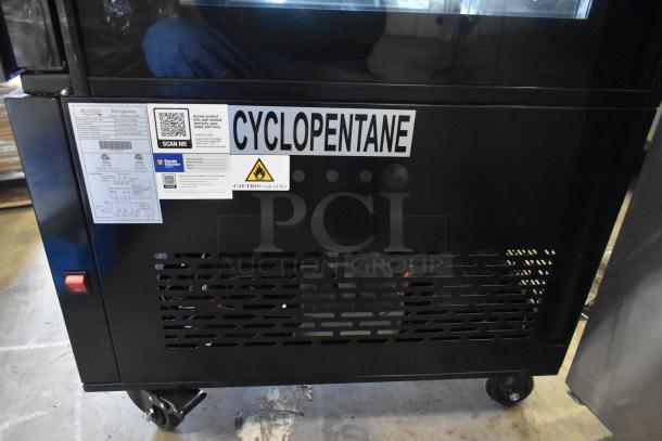 Brand new Avantco 193GD4C15HCB 4-sided glass refrigerated display case. Black finish, on commercial casters, 110-120V.